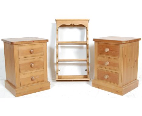 A pair of antique style country&nbsp; pine bedside pedestal chests of drawers - cabinets. Each having a shaped edge over thre