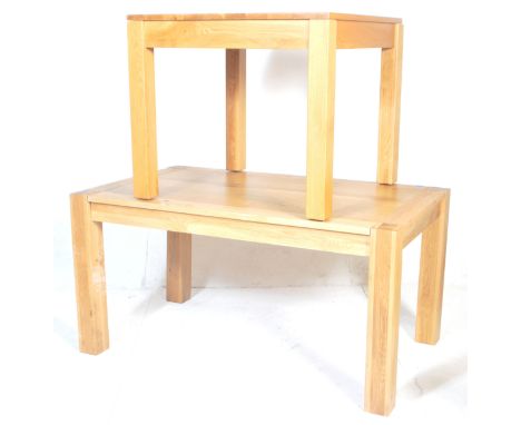 A pair of original contemporary light oak dining tables of Oak Furniture Land style. One of square form, the other rectangula