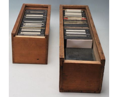 A large collection of antique late 19th century early 20th century glass magic lantern glass slides. Approximately 163 in tot