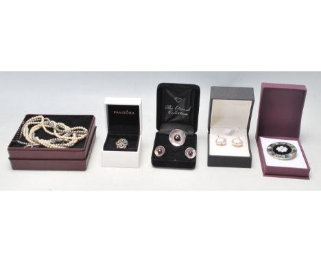 A collection of ladies jewellery to include a silver ring and earring set all being set with black pearls (stamped 925), a si