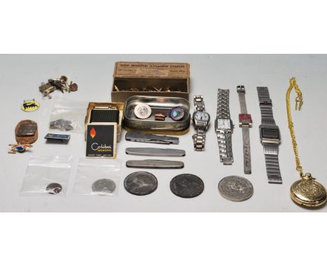 Box of assorted items: watches (4), pen knives (3), Colibri Monpol lighter in box with leaflet, badges, medallions and gold m