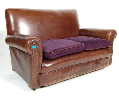 An early 20th century circa 1930's Art Deco French Club / Chesterfield&nbsp; brown leather sofa settee with metal studs and f