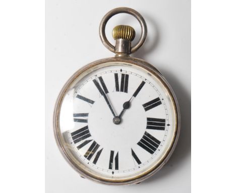A 20th century silver goliath pocket watch having a round face with Roman numerals to the chapter ring, the interior of the c