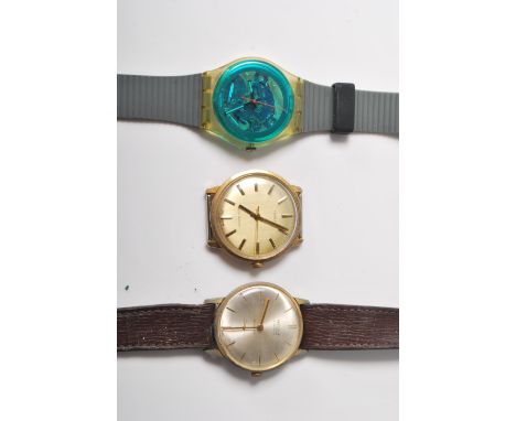 A collection of three vintage wristwatches to include a Swatch Quartz Swiss made wristwatch with skeleton, a Timex watch and 