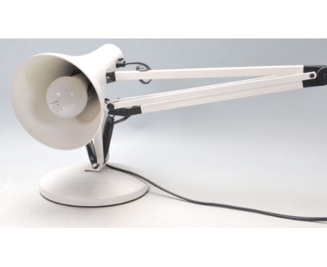A retro vintage 20th century industrial anglepoise lamp in the manner of Herbert Terry.&nbsp;Raised on circular base with con