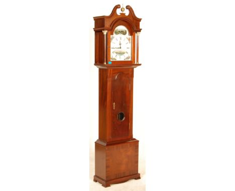 A 20th Century good quality Richard Broad longcase grandfather clock having a mahogany case with a swan neck pediment top and