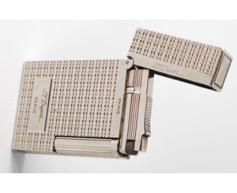 A vintage retro Du Pont lighter having engraved geometric decoration with a rectangular panel to the front engraved SJ Du Pon