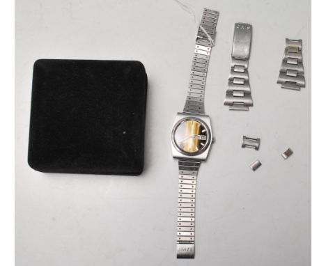 A vintage gentleman's 1970's Oris Star Automatic 21 jewels wrist watch having a round tigers eye style dial with with enamell