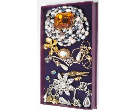 A collection of vintage costume jewellery to include a a tri colour freshwater pearl necklace (measures 53 inches), to pairs 