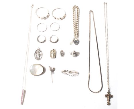 A large collection of hallmarked sterling silver jewellery to include a solid silver bracelet with heart lock and safety chai