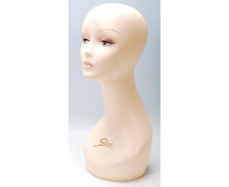 A vintage retro 20th century shop haberdashery point of sale / counter top female mannequin dummy head with hand painted feat