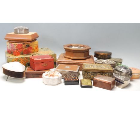 A large collection of vintage jewellery boxes to include wooden examples, white metal with relief decoration examples, transf