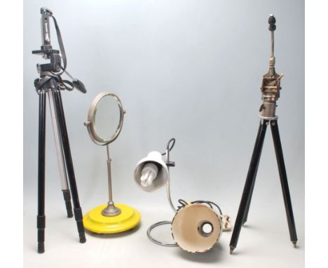 A retro vintage lot to include a chrome twist base desk lamp with white shade, a tabletop adjustable mirror with bevelled edg