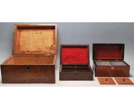 A group of three 19th Century antique wooden desk top boxes to include a large walnut writing box, a mahogany tea caddy with 