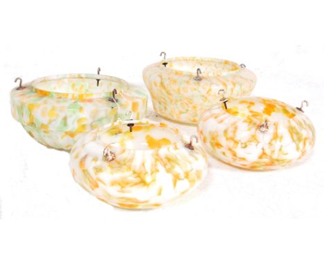 A collection of 4 vintage 1930s Art Deco frosted and coloured glass&nbsp; dome shaped ceiling lamp light shades/ The ceiling 