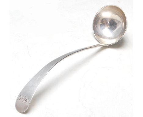 A Georgian Scottish silver chocolate ladle having engraved initials to the terminal ' J E G'. Hallmarked Edinburgh 1806 with 