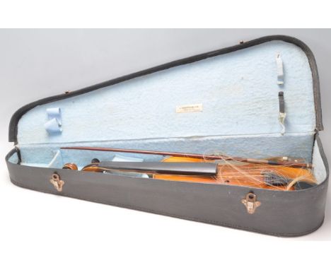 An early 20th Century Czechoslovakian Antonius Stradivarius made violin having a hollow body with S shaped sound holes, eboni