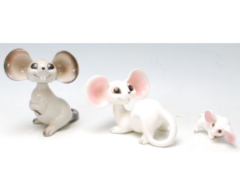 A group of 1960’s vintage German ceramic mice comprising of a pair of white and pink mice sitting on four legs with a nodding