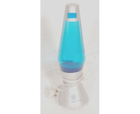 An amazing retro vintage 20th century Mathmos lava lamp having aluminium silver base and top and blue lava glass cylinder. Me