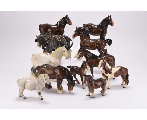 A collection of Beswick horses, comprising a Pinto Skewbald pony, Beswick dark brown Thoroughbred stallion, a Grey Shire hors