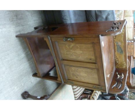 An Art Nouveau Galle inspired mahogany and marquetry galleried cabinet, decorated with snowdrops and fish, the side with fret