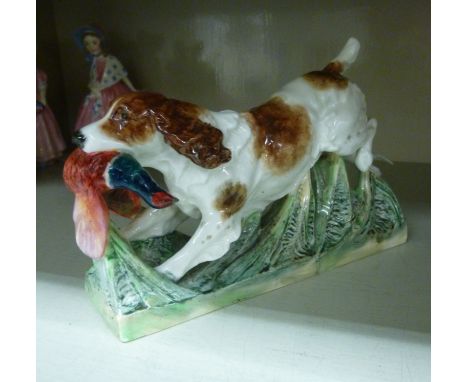 A Royal Worcester porcelain model 'Springer Spaniel', modelled by Doris Lindner  No.3232  4.25''h       0S2