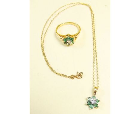 A 9 carat gold emerald and diamond ring, size K - L, a 9 carat gold emerald and diamond pendant and 9 carat gold chain 