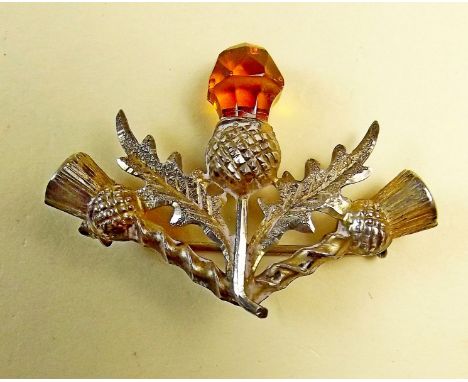 A Scottish silver stone set thistle brooch by C &amp; N