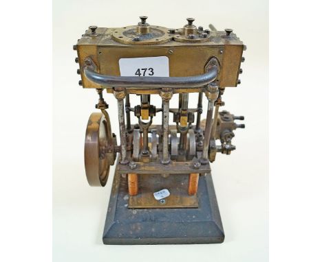 A good working model of twin cylinder double expansion marine engine