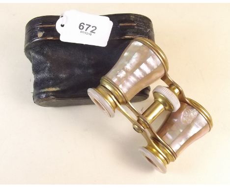 A pair of Victorian mother of pearl clad opera glasses in original Negretti and Zambra case