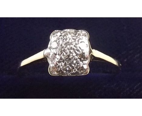 A white gold or platinum ring pave set square panel of twelve diamonds, size P