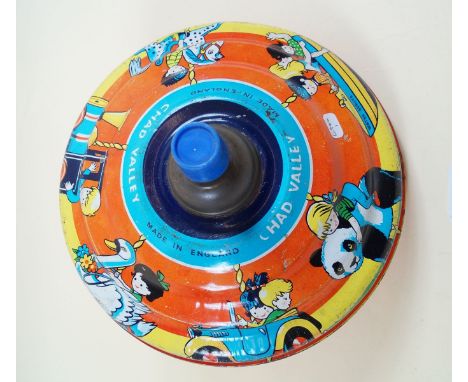 A Chad Valley tin plate spinning top