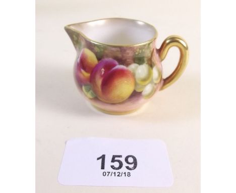 A Royal Worcester hand painted miniature jug, signed and dated 1955