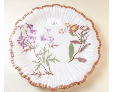 A Royal Worcester floral painted plate on ivory ground