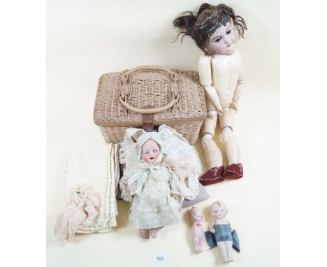 An Armand Marseille bisque headed doll 1894 No. 8 , a&nbsp; Heubach bisque headed doll 267.12/o and two Kewpie dolls