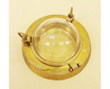 A large brass bulkhead light - 26cm dia