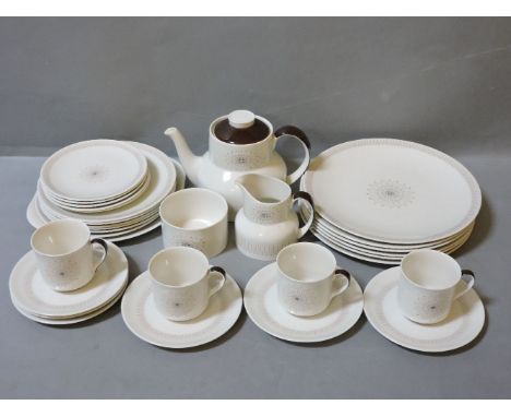 A Royal Doulton part teaset and dinner service, Morning Star pattern, consisting of twelve cups and saucers, side plates, san