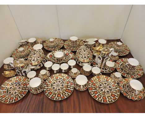 An extensive Royal Crown Derby Imari pattern dinner, tea and coffee service, to include eight each of dinner plates, tea plat