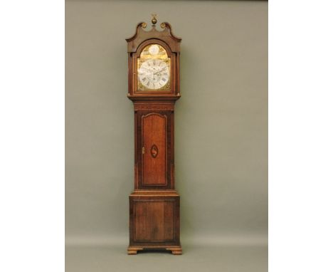 A 19th century longcase clock, the inlaid oak case with arched brass dial, inscribed 'Tempus Fugit', with eight day striking 