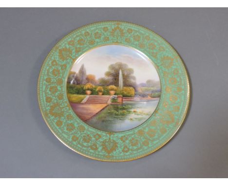 A Royal Worcester plate, titled in script on the back 'The Lake, Branham Park, Yorkshire', and also inscribed 'Sandor Decseny