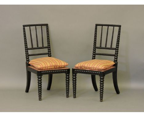 A pair of late 19th century bobbin turned ebonised chairs