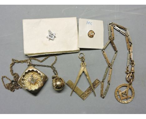 A 9ct two coloured gold chain, with 9ct gold Masonic pendant, a silver gilt and gold articulated bail in mount stamped 9ct on