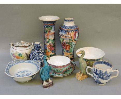 A Canton enamel cup and saucer, 18th century Mandarin palette vases, chocolate cup, miniature moon flask, bowls, teapot, and 