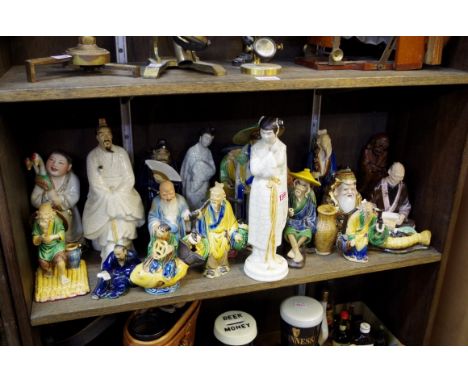 A collection of Oriental ceramic figures.&nbsp; 