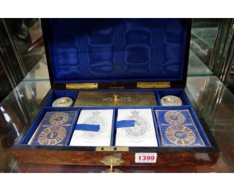 A Victorian burr walnut games box, bearing gilt brass plaque inscribed 'F Aldis, 11 Belgrave Mansions', with a hinge top encl