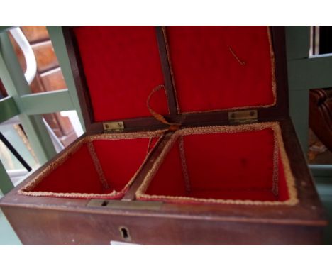 An early 19th century mahogany and crossbanded tea caddy,&nbsp;26.5cm wide; together with another 19th century mahogany caske