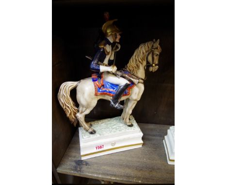 Three Italian porcelain figures of Napoleonic, largest 37cm high. 