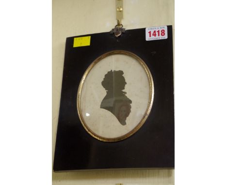 A pair of 19th century portrait silhouettes,&nbsp;12.5 x 9.5cm oval.&nbsp; 