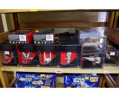 Twenty-two Hasbro Star Wars 'Titanium Series' boxed model sets; together with eight other boxed models.&nbsp; 