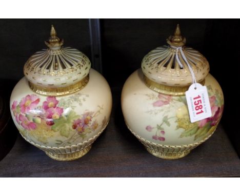 A pair of Royal Worcester blush ivory pot-pourri vases and covers,&nbsp;one with internal cover, one outer cover repaired, 19